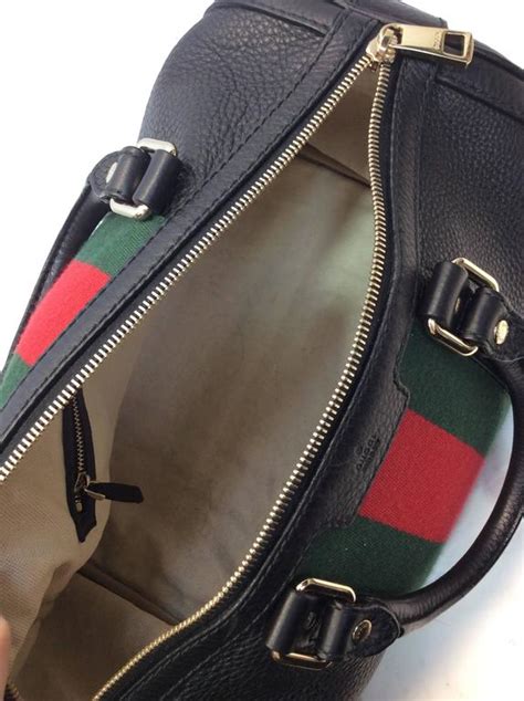 gucci black striped barrel bag|vintage gucci barrel bag.